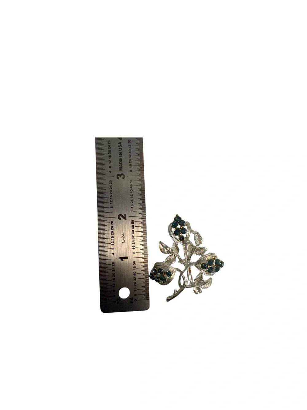 Silver Floral Leaf Brooch with Blue Stones
